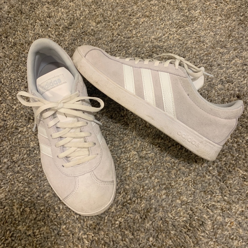 Gray and white adidas sneakers
